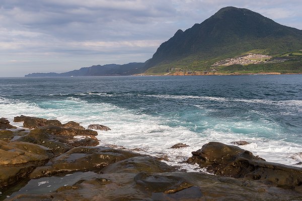 View of stones, river and a mountain