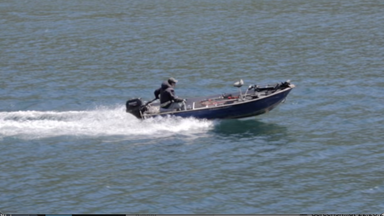 a man going for fishing in his boat