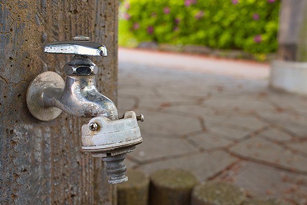 old ancient tap in the park