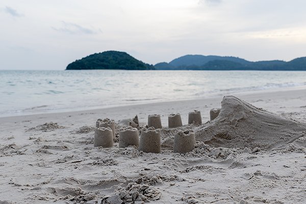 sand castle near the beach and mountains